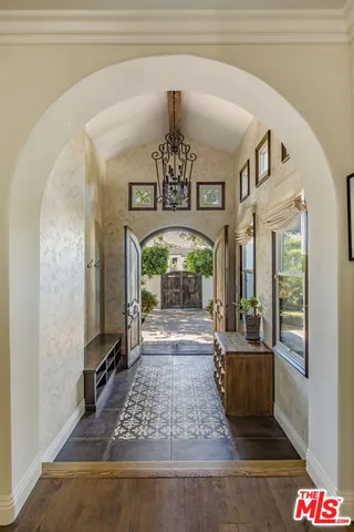 a view of entryway with a front door