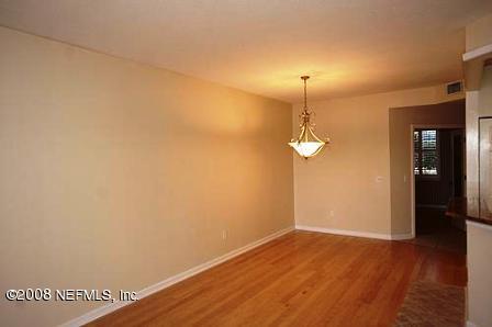 3406 Haley Pointe Road St. Augustine, FL 32084 - Photo 3 of 14 a view of a room with wooden floor