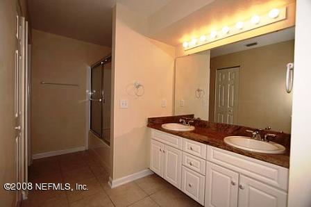 3406 Haley Pointe Road St. Augustine, FL 32084 - Photo 7 of 14 a bathroom with a sink and a mirror