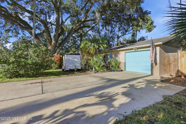 front view of a house with a street