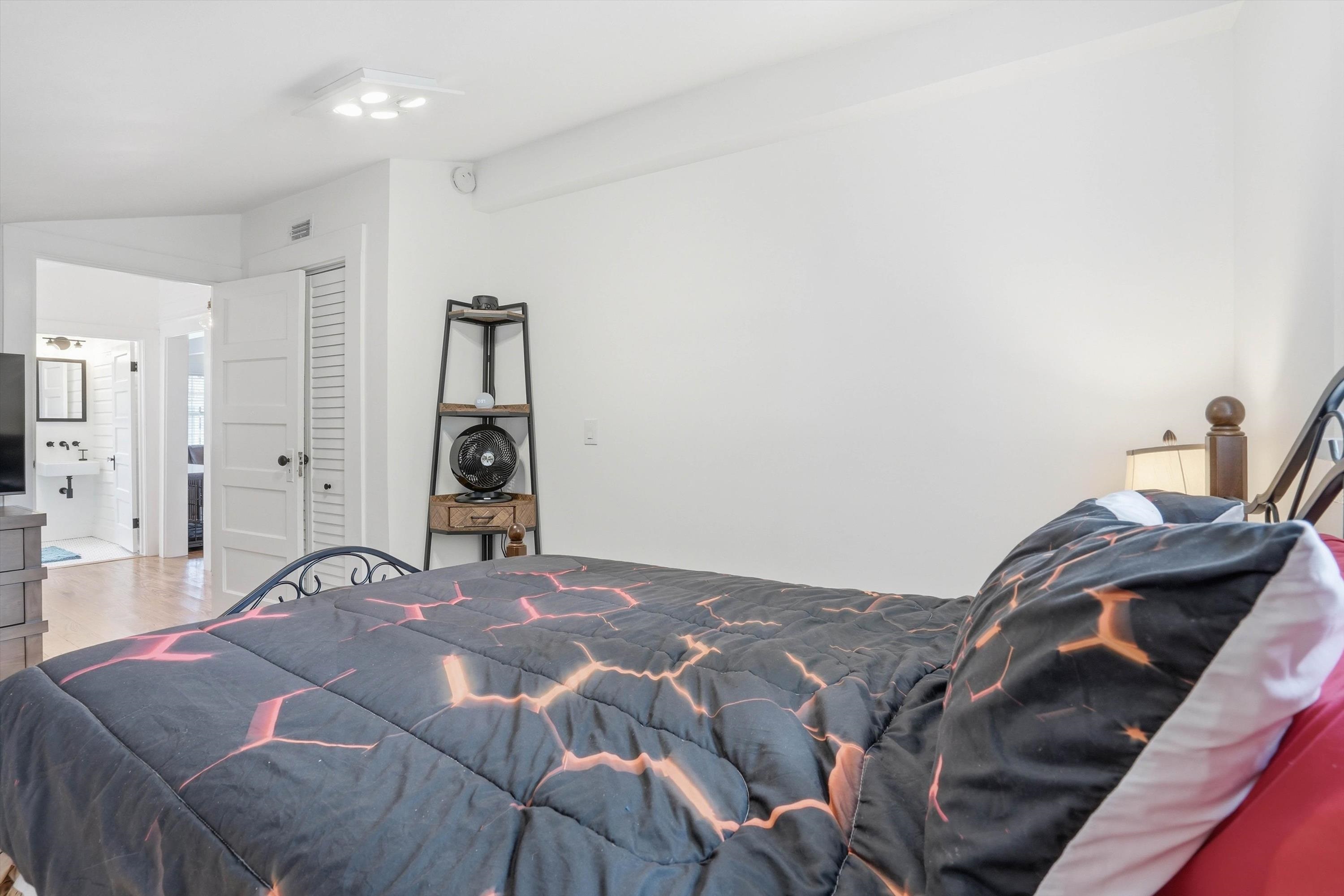 76 Oneida Street St. Augustine, FL 32084 - Photo 27 of 38 a bedroom with a bed and a closet