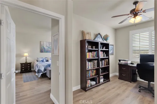 a view of a bedroom from a hallway