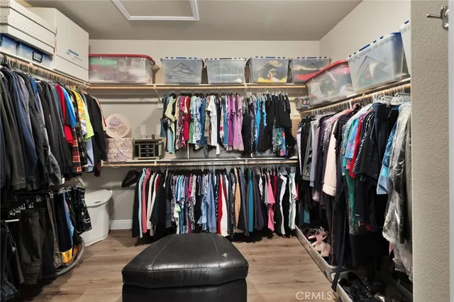 a view of a swimming pool and outdoor seating