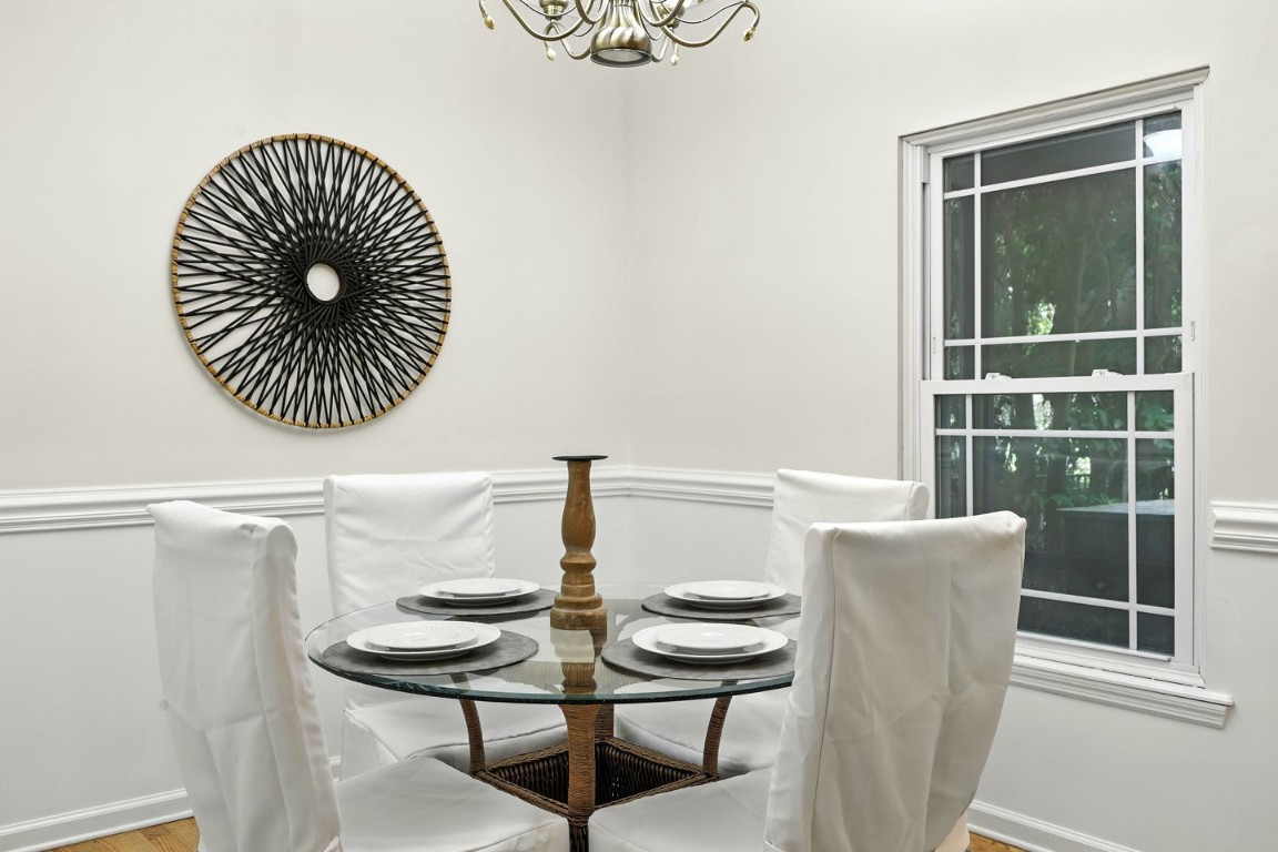 86168 Remsenburg Drive Fernandina Beach, FL 32034 - Photo 13 of 68 a kitchen with a table and a chair