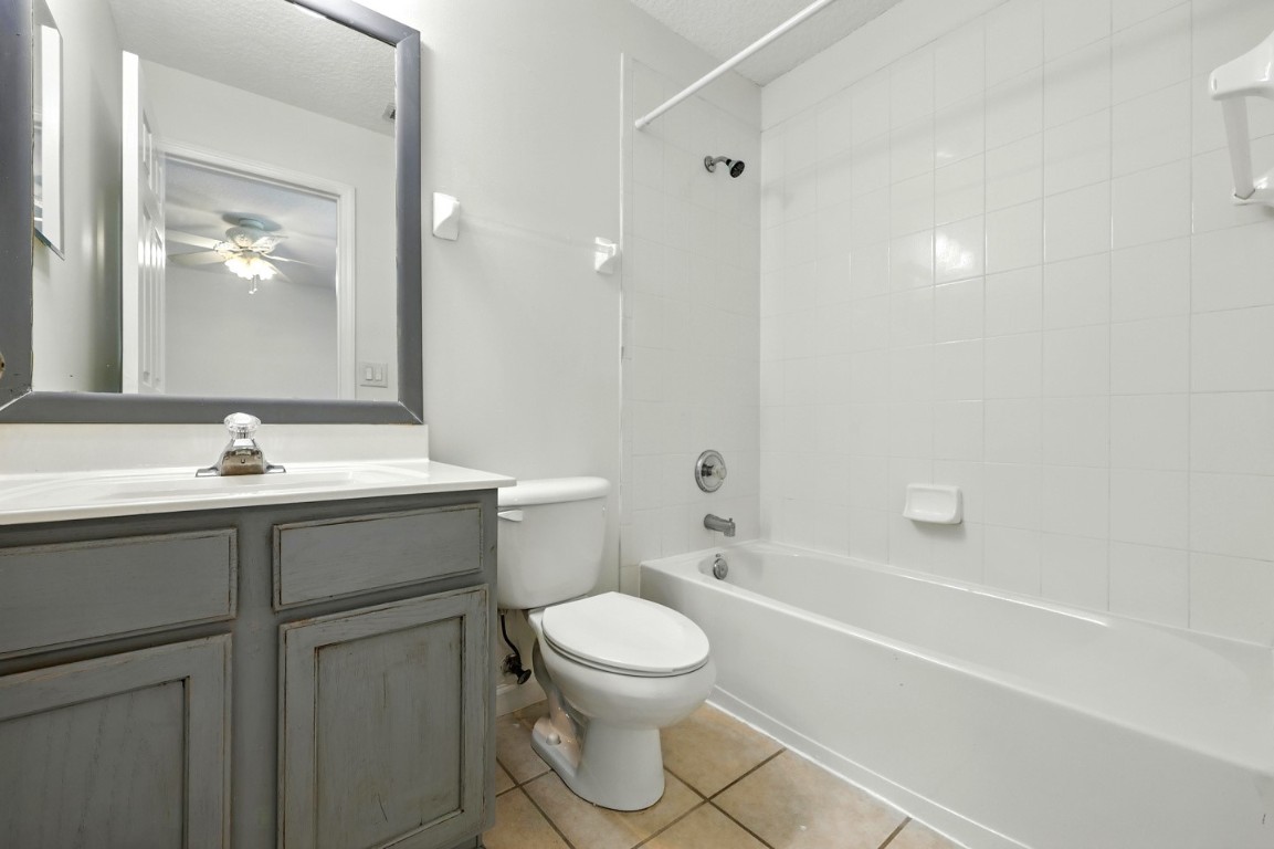 86168 Remsenburg Drive Fernandina Beach, FL 32034 - Photo 28 of 68 a bathroom with a sink toilet vanity and shower
