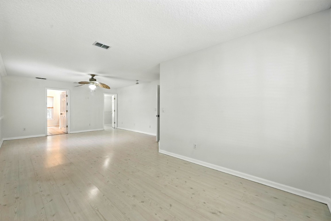 86168 Remsenburg Drive Fernandina Beach, FL 32034 - Photo 36 of 68 wooden floor in an empty room