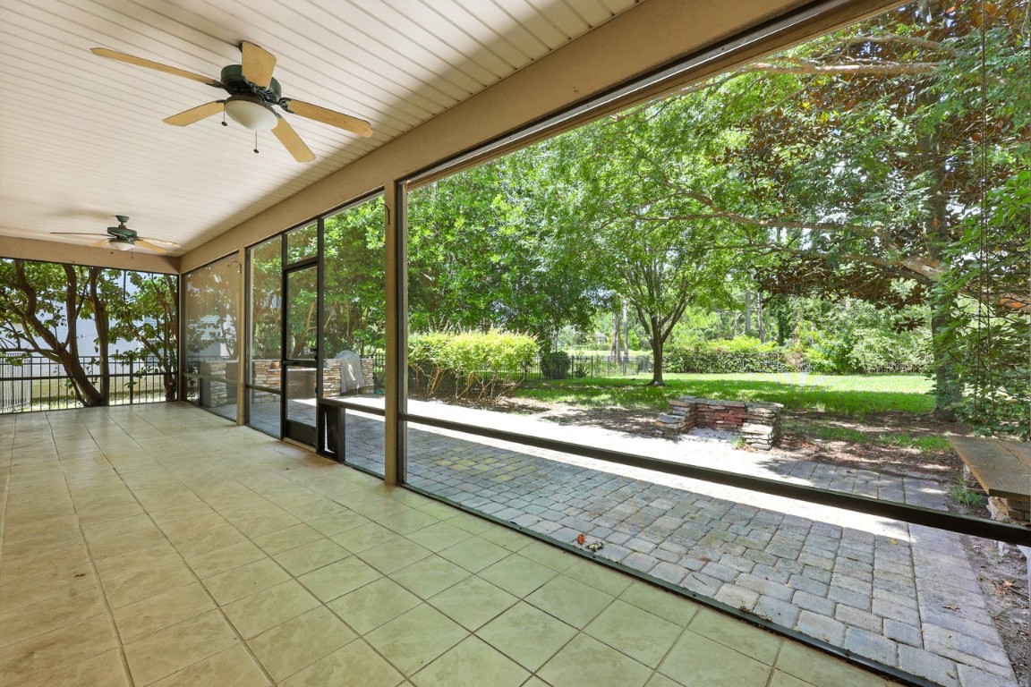 86168 Remsenburg Drive Fernandina Beach, FL 32034 - Photo 39 of 68 a view of a room with porch and wooden floor