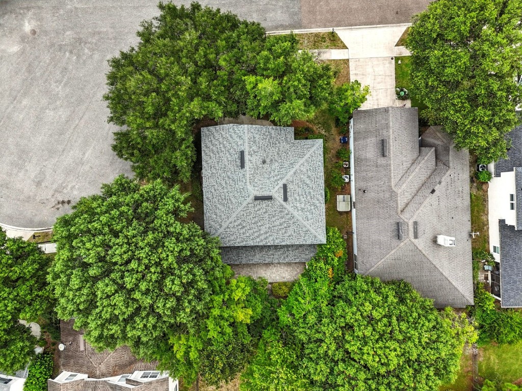 86168 Remsenburg Drive Fernandina Beach, FL 32034 - Photo 44 of 68 an aerial view of a house with outdoor space and trees all around