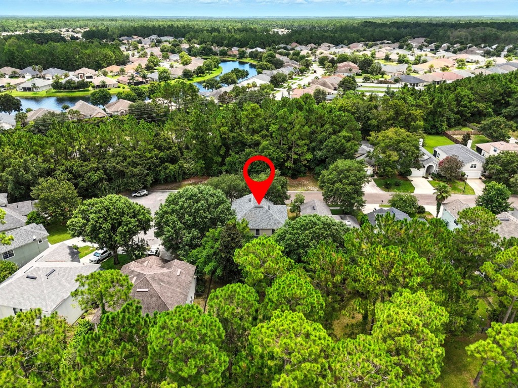 86168 Remsenburg Drive Fernandina Beach, FL 32034 - Photo 45 of 68 an aerial view of a house with a yard
