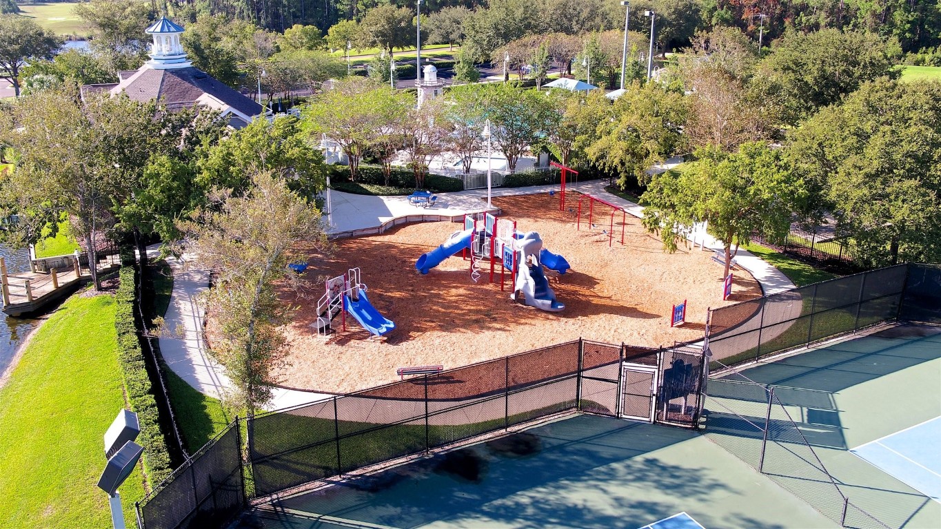 86168 Remsenburg Drive Fernandina Beach, FL 32034 - Photo 68 of 68 a view of a chairs and table in the patio