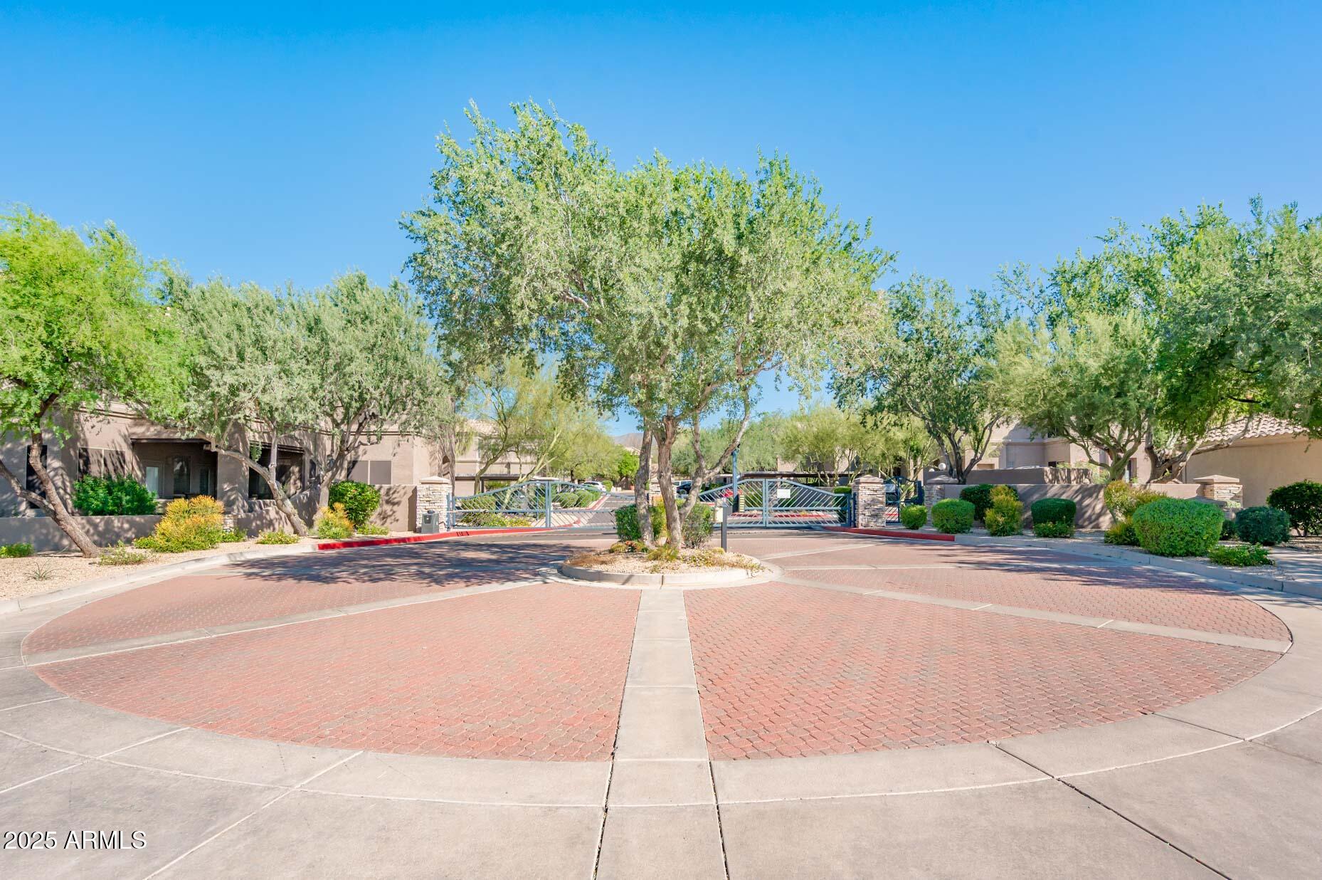 11680 East Sahuaro Drive, Unit 2021 Scottsdale, AZ 85259 - Photo 9 of 51 a view of a street with houses