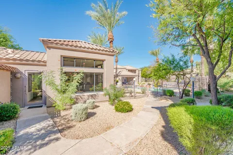 a view of a house with backyard porch and patio