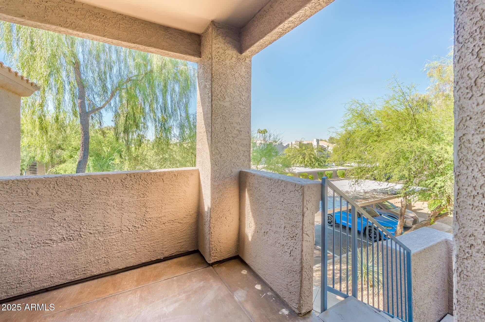 11680 East Sahuaro Drive, Unit 2021 Scottsdale, AZ 85259 - Photo 15 of 51 a view of a balcony with an outdoor space