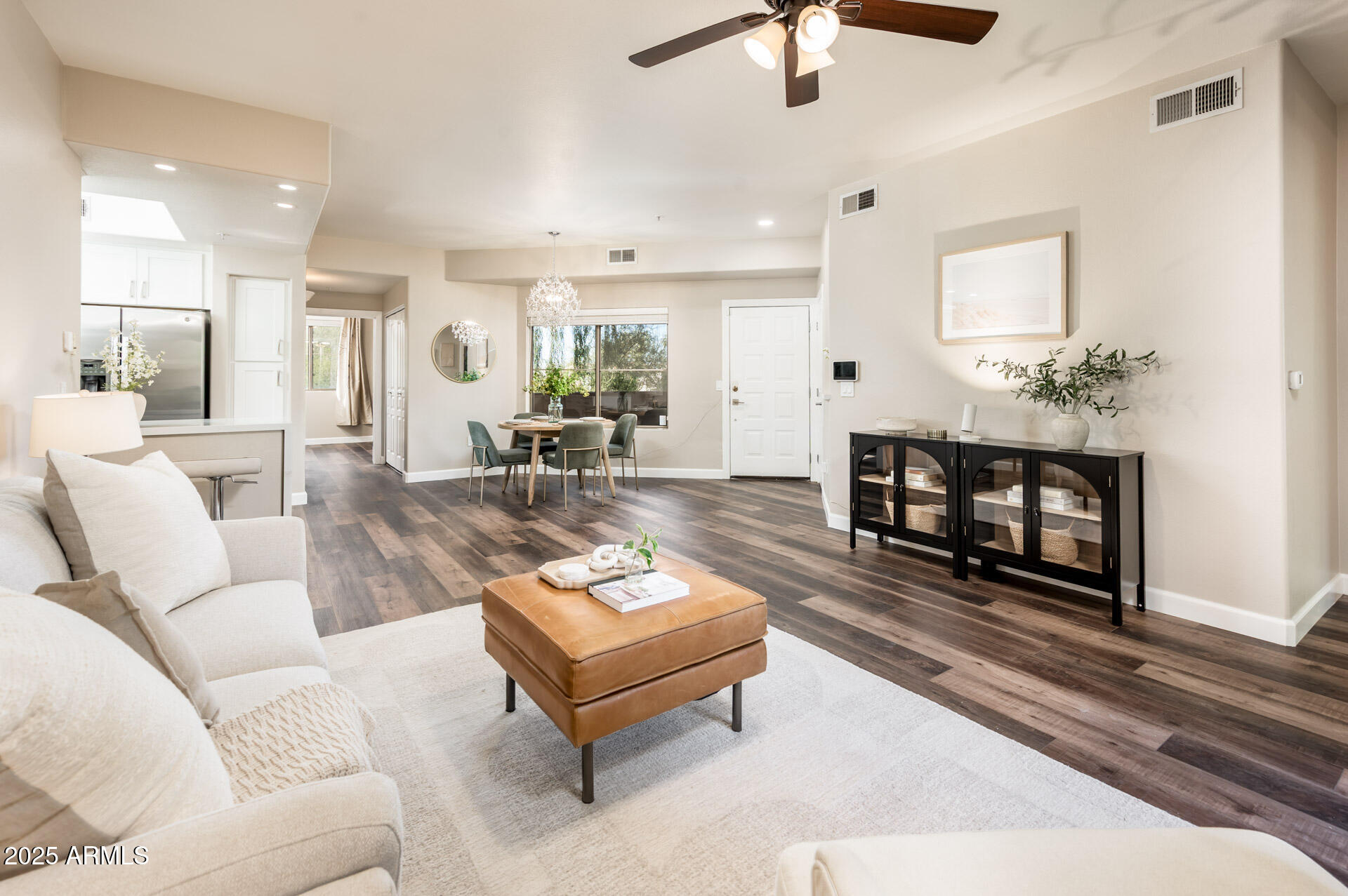 11680 East Sahuaro Drive, Unit 2021 Scottsdale, AZ 85259 - Photo 18 of 51 a living room with furniture and a fireplace