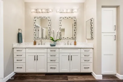 a bathroom with a shower a toilet and a window