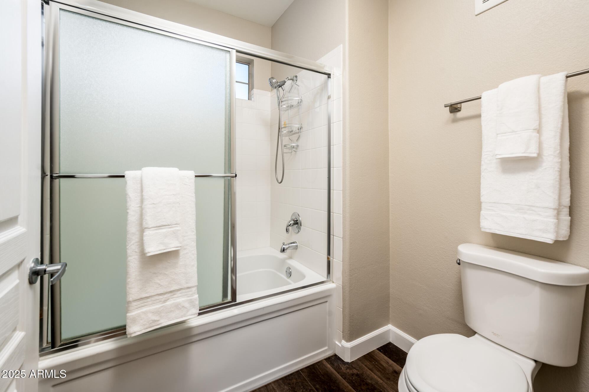 11680 East Sahuaro Drive, Unit 2021 Scottsdale, AZ 85259 - Photo 33 of 51 a bathroom with a shower a toilet and a window