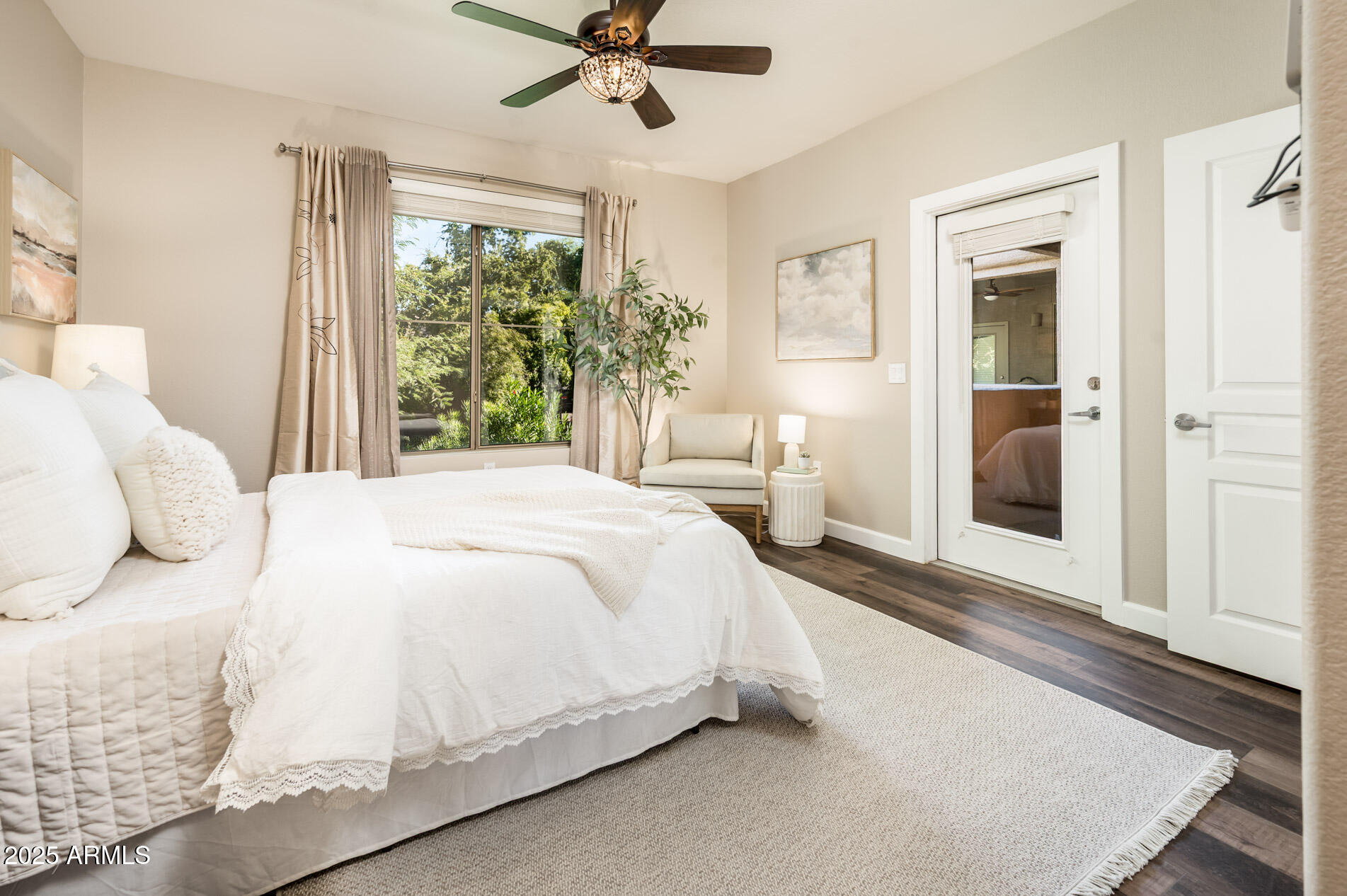 11680 East Sahuaro Drive, Unit 2021 Scottsdale, AZ 85259 - Photo 4 of 51 a bedroom with a large bed and a window