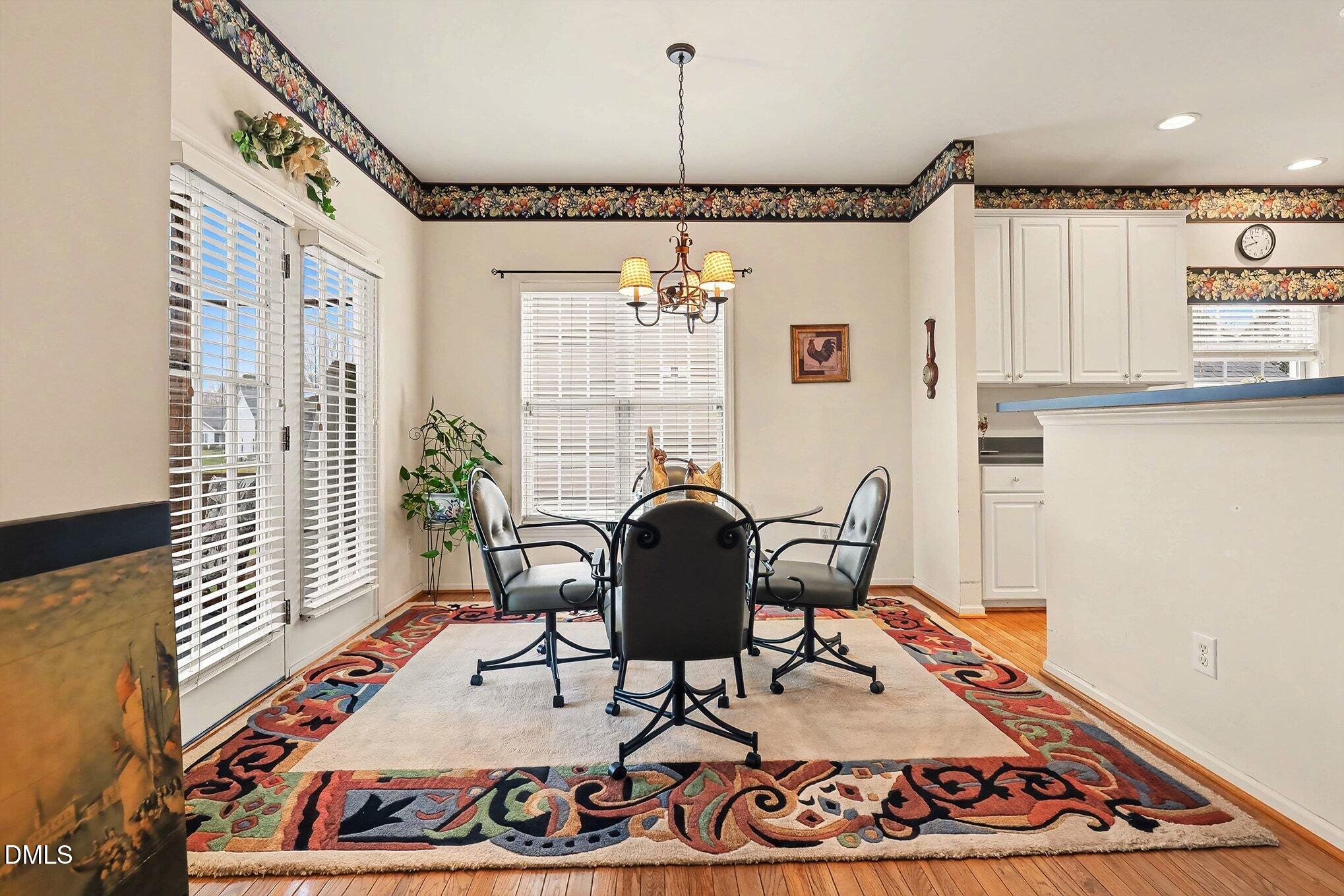 411 Latta Circle Durham, NC 27712 - Photo 17 of 36 a living room with furniture and a rug