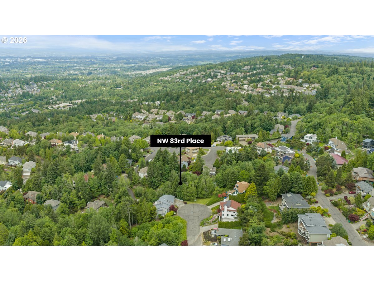 Northwest 83rd Place Portland, OR 97229 - Photo 6 of 6 a view of a city with lush green forest