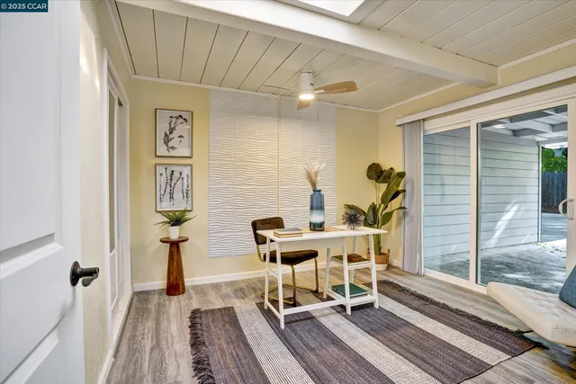 a workspace with furniture and window