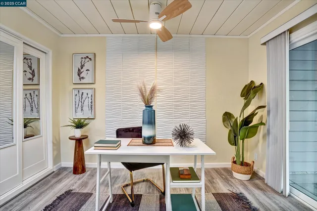 a workspace with furniture and window