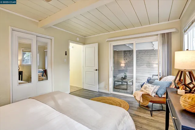 a utility room with cabinets washer and dryer
