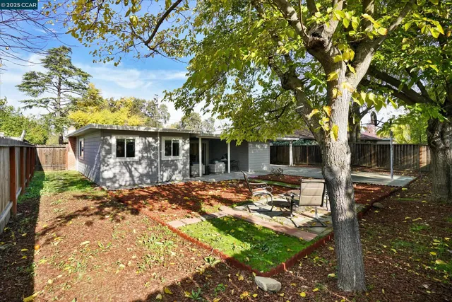 a view of outdoor space with lots of cars parked