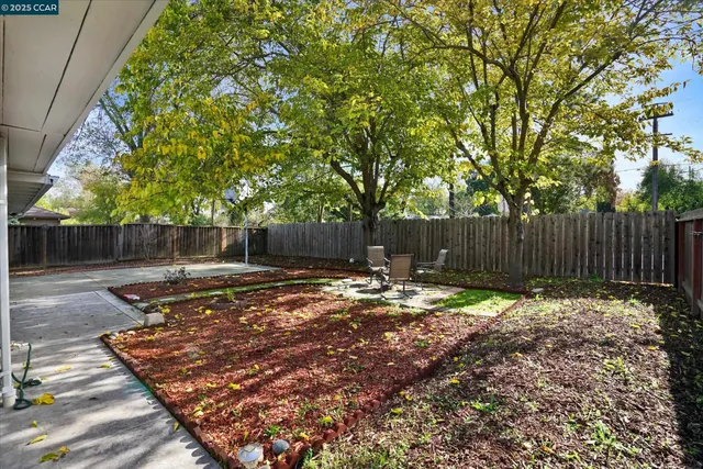 a view of a street sign of a house