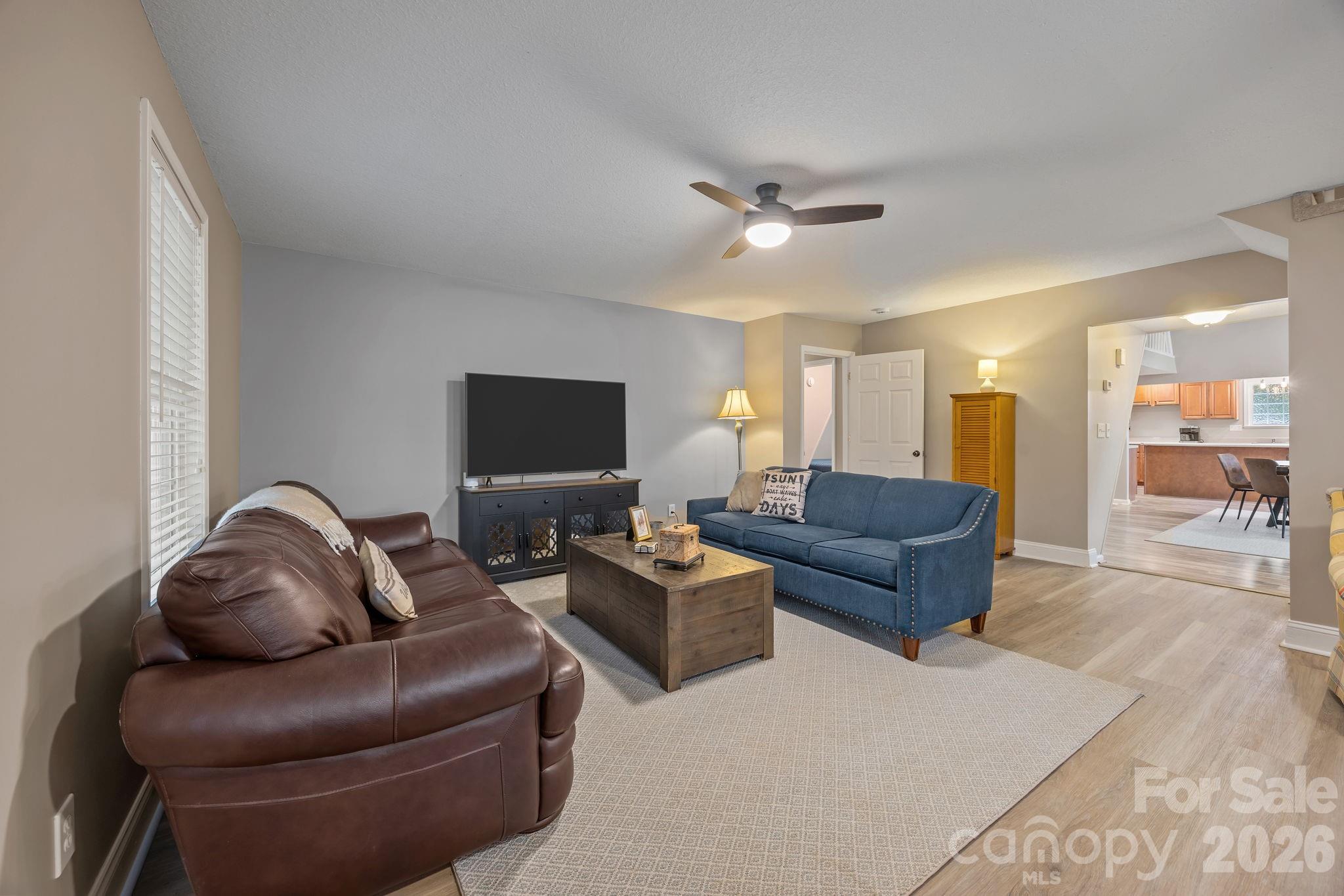 1870 Scout Road Salisbury, NC 28146 - Photo 24 of 48 a living room with furniture and a wooden floor