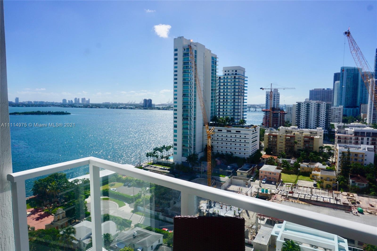 601 Northeast 27th Street, Unit 1604 Miami, FL 33137 - Photo 12 of 47 a view of a city skyline from a balcony