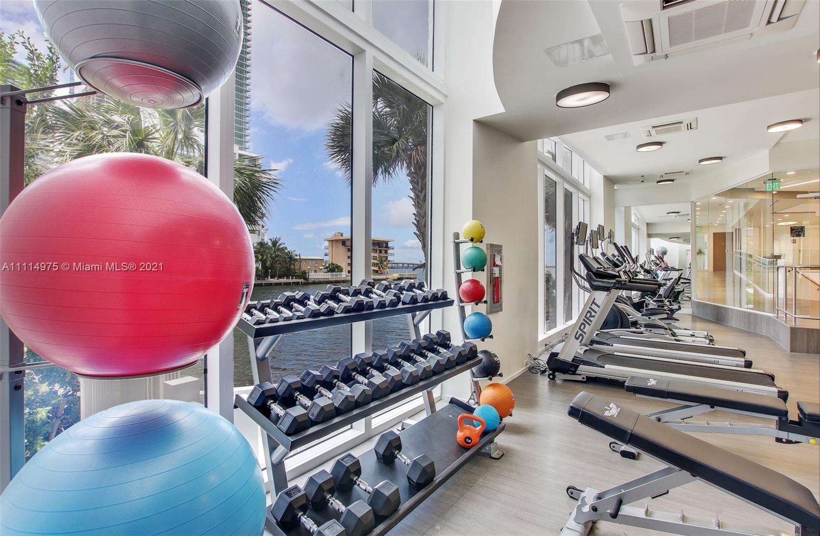 601 Northeast 27th Street, Unit 1604 Miami, FL 33137 - Photo 25 of 47 a view of a room with gym equipment