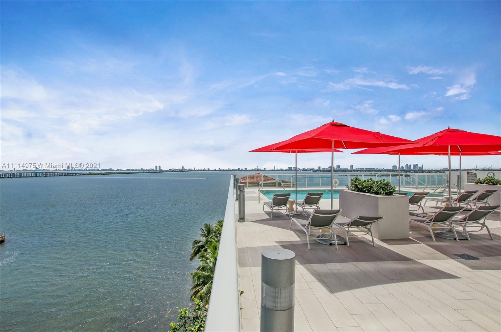 601 Northeast 27th Street, Unit 1604 Miami, FL 33137 - Photo 30 of 47 a view of a balcony with chair and table