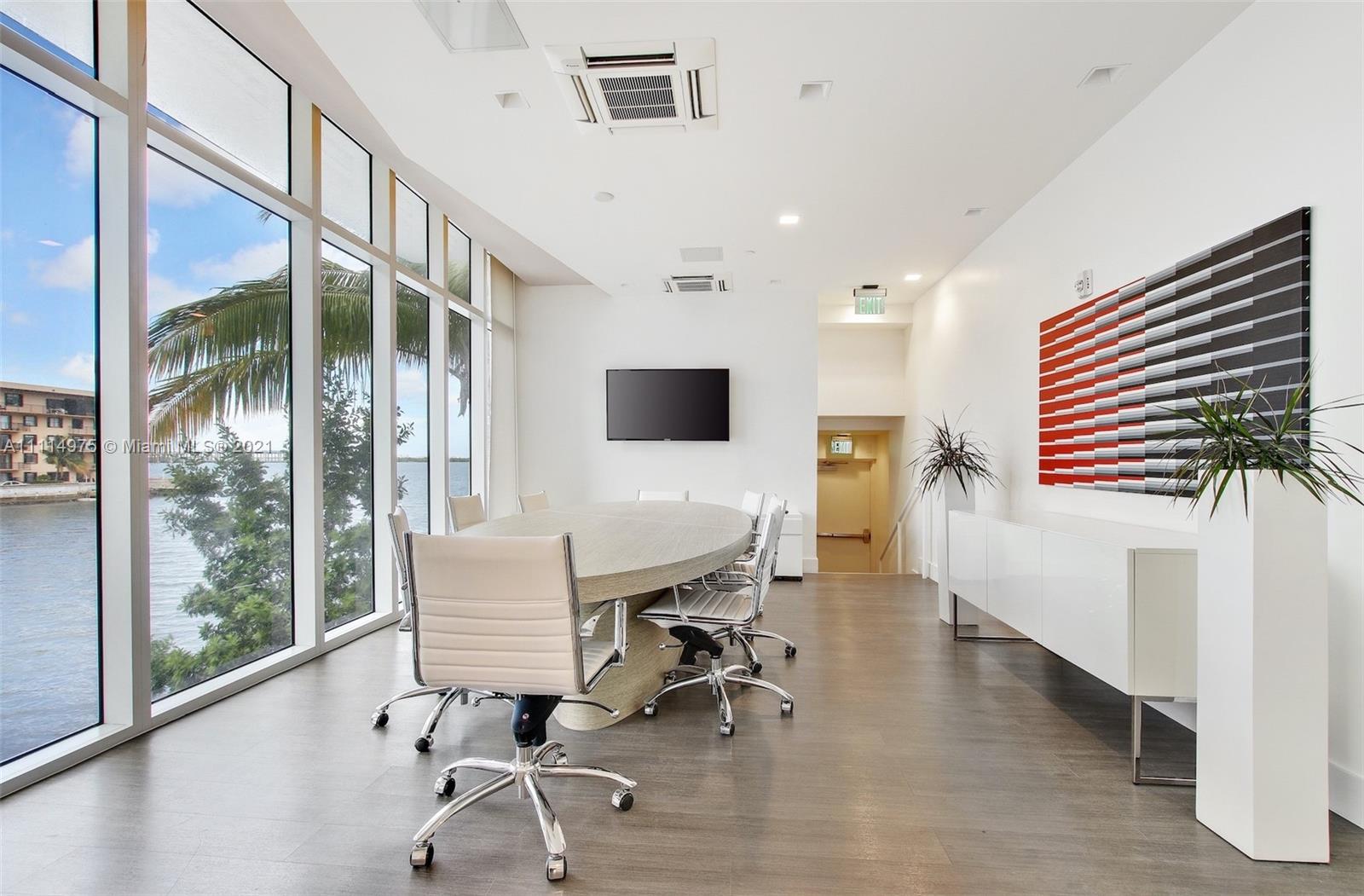 601 Northeast 27th Street, Unit 1604 Miami, FL 33137 - Photo 47 of 47 a view of a workspace with furniture and a window