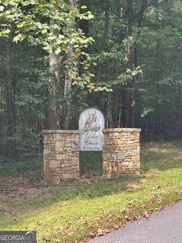 a view of swimming pool with a bench