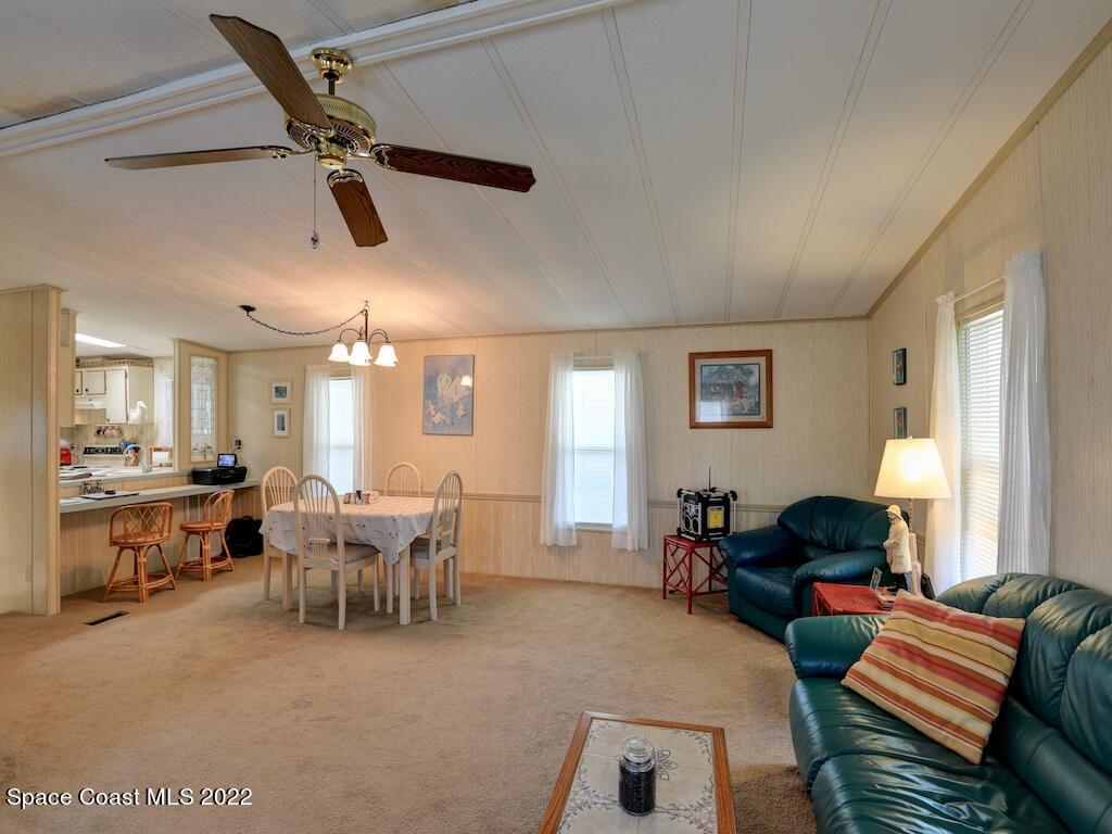 622 Wedelia Drive Sebastian, FL 32976 - Photo 11 of 29 a living room with furniture and a window