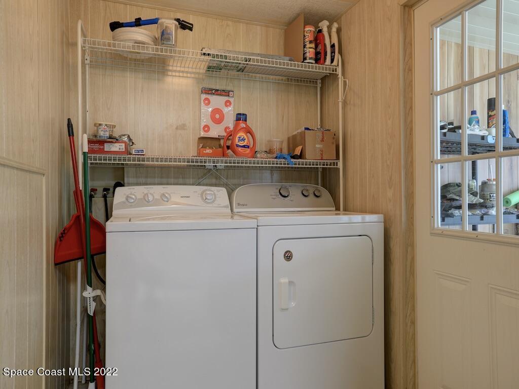 622 Wedelia Drive Sebastian, FL 32976 - Photo 25 of 29 a utility room with dryer and washer