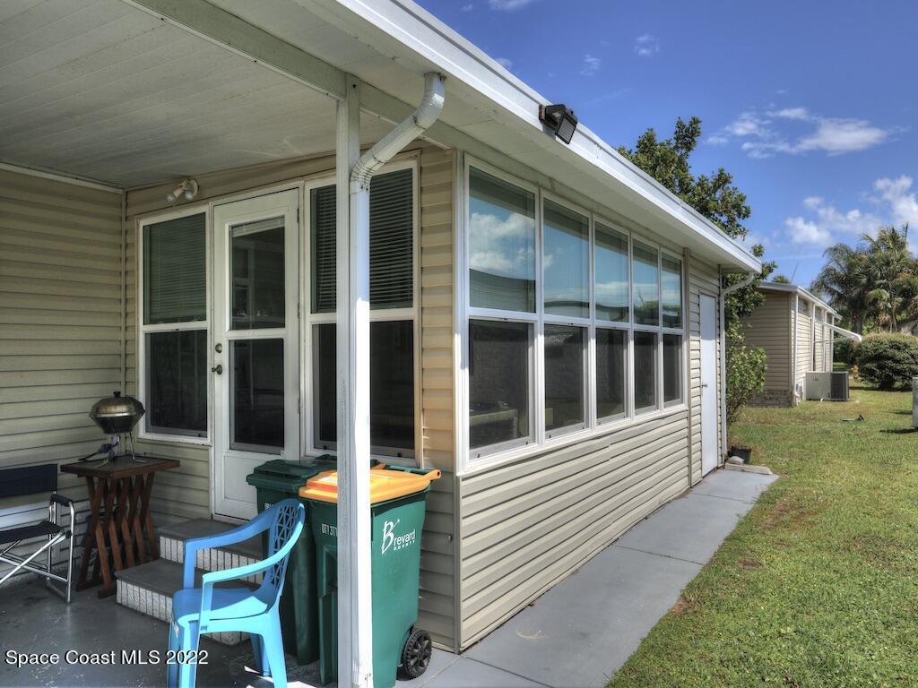 622 Wedelia Drive Sebastian, FL 32976 - Photo 6 of 29 a view of a house with backyard and porch