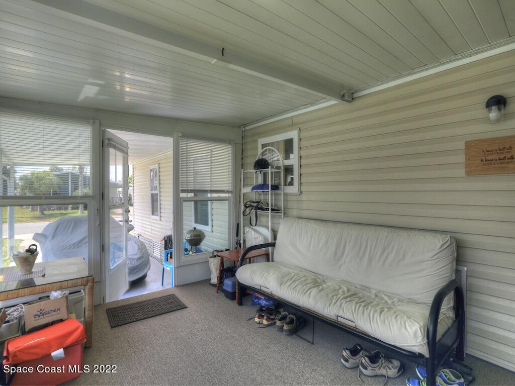 622 Wedelia Drive Sebastian, FL 32976 - Photo 8 of 29 a living room with furniture and a table