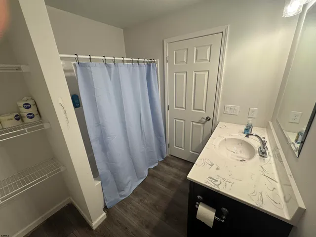 a bathroom with a sink and tub