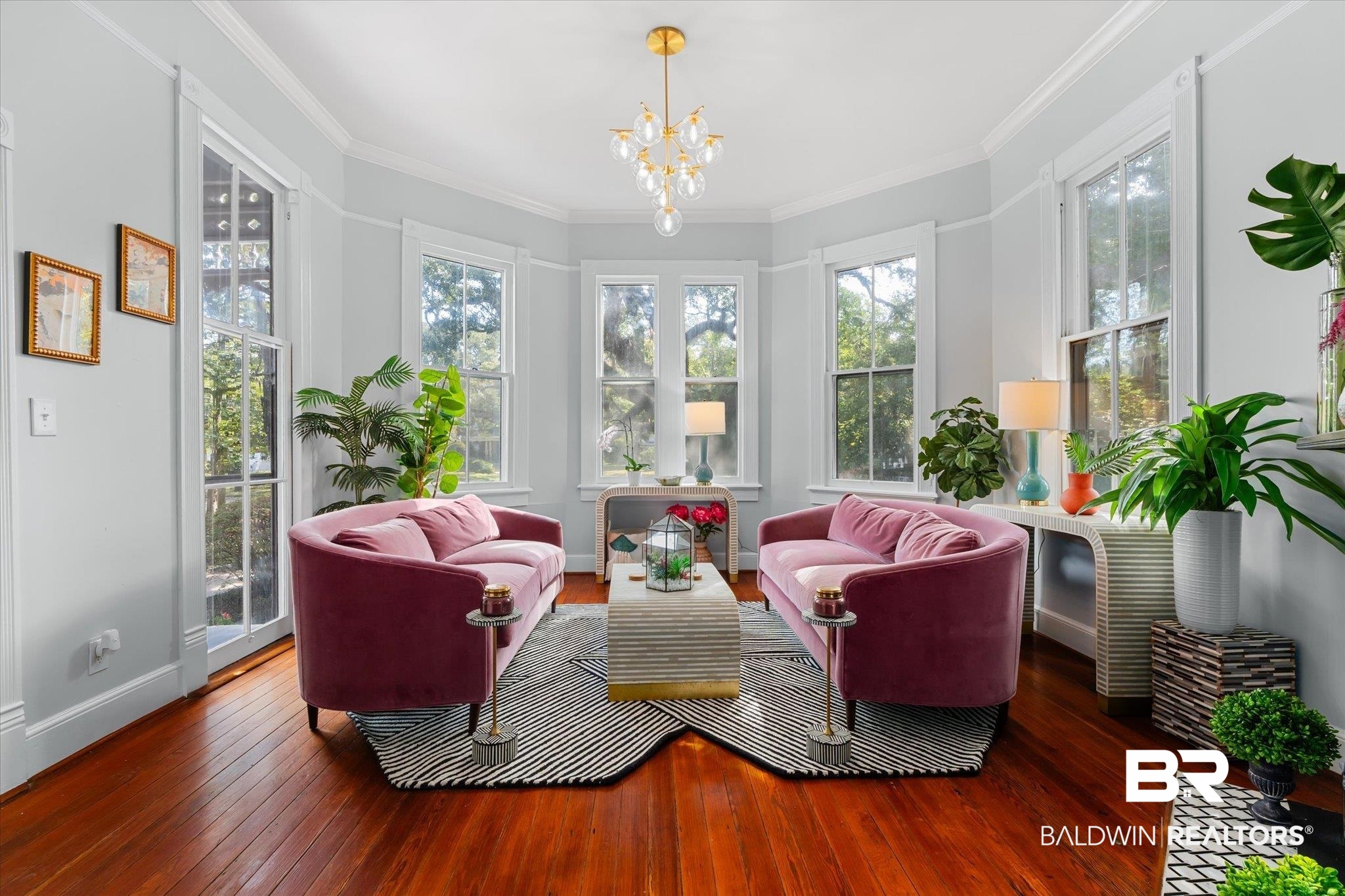 1210 Government Street Mobile, AL 36604 - Photo 6 of 37 Sunroom / solarium with a healthy amount of sunlight and a chandelier