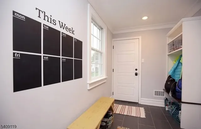 a view of a hallway with workspace