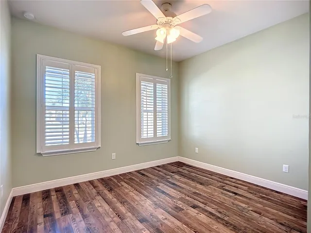 a view of a livingroom with wooden floor and closet
