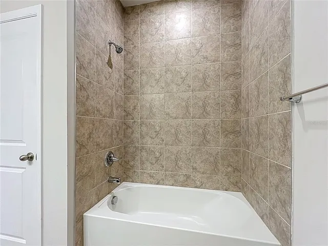 a view of room window and wooden floor