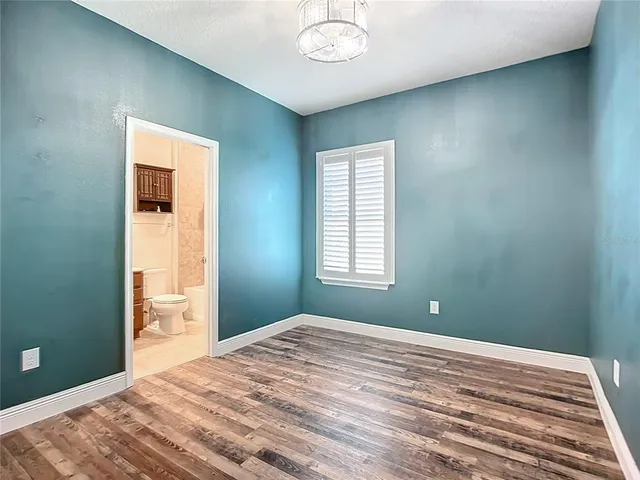 a view of a closet area with cabinets