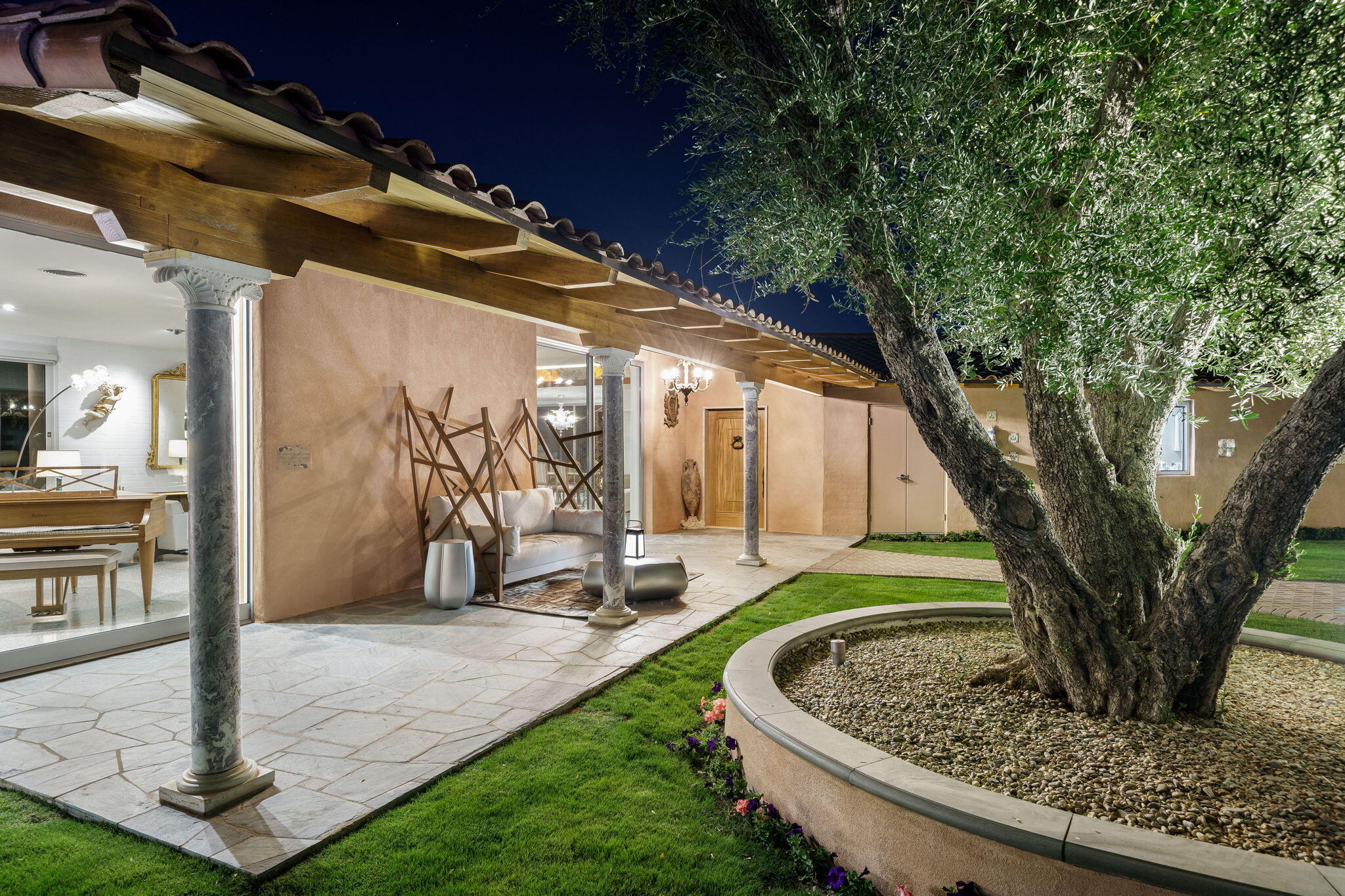 51555 Madison Street La Quinta, CA 92253 - Photo 24 of 25 a front view of a house with garden