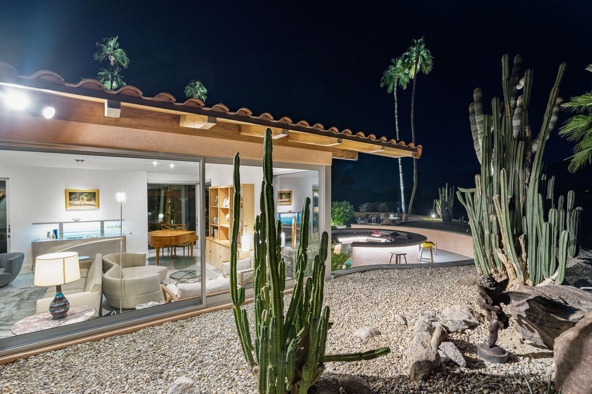 51555 Madison Street La Quinta, CA 92253 - Photo 25 of 25 a view of a patio with table and chairs potted plants
