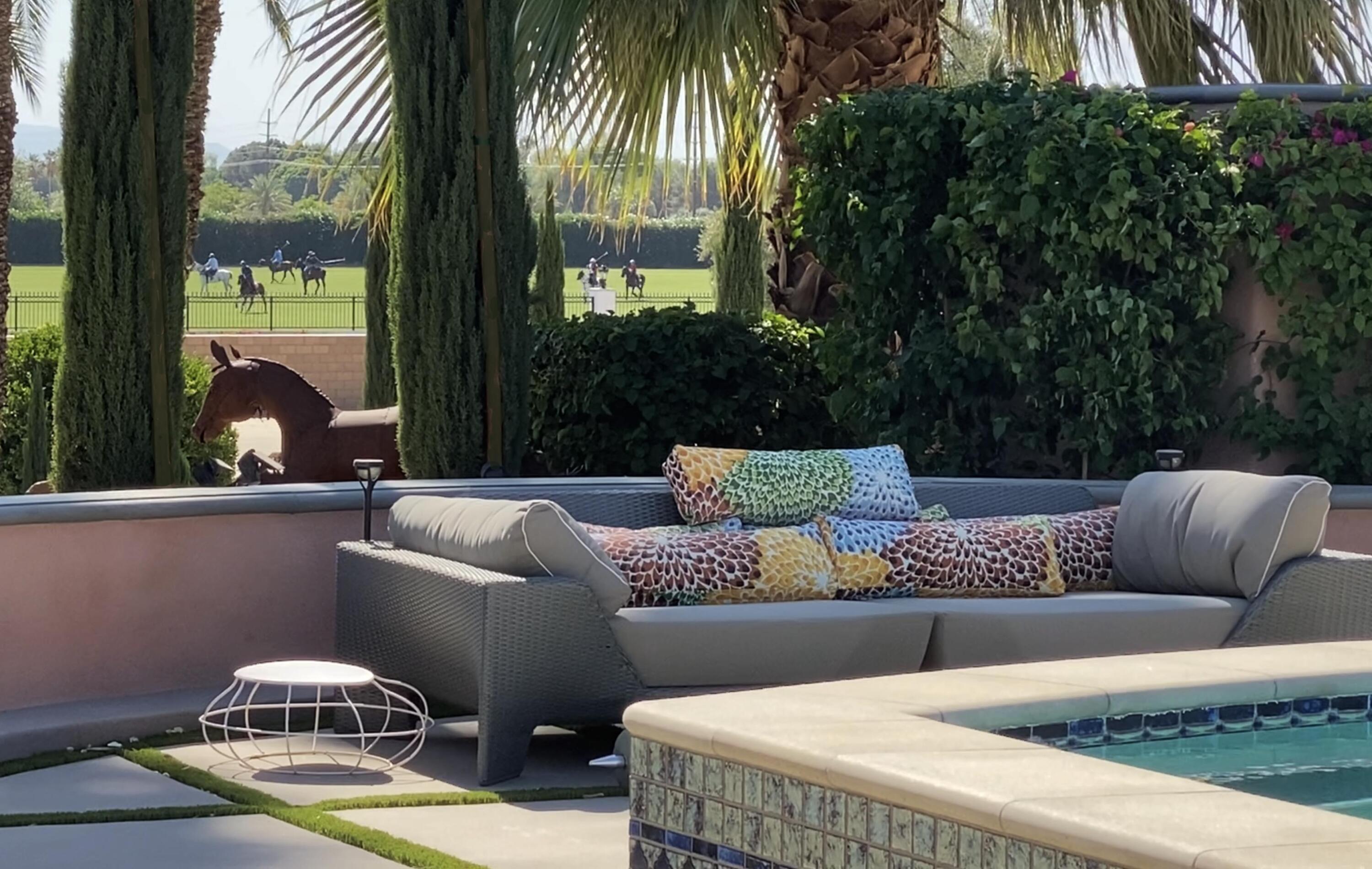 51555 Madison Street La Quinta, CA 92253 - Photo 5 of 25 a view of swimming pool with outdoor seating and couches