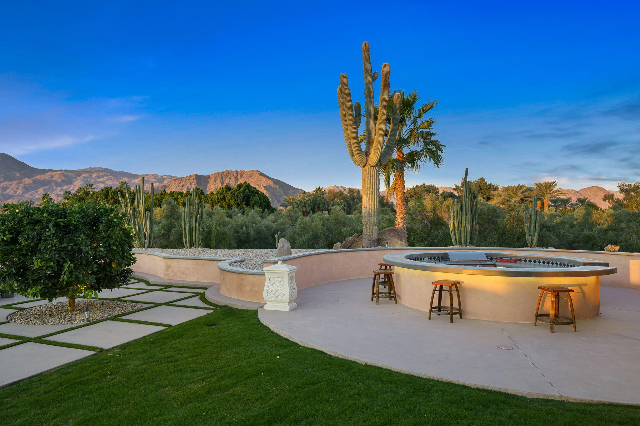 51555 Madison Street La Quinta, CA 92253 - Photo 7 of 25 a view of a house with pool and a yard