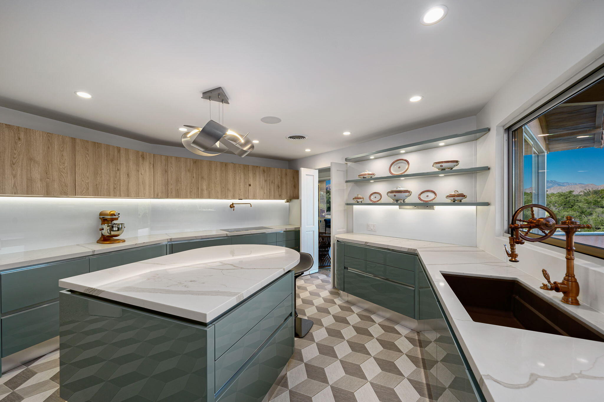 51555 Madison Street La Quinta, CA 92253 - Photo 10 of 25 a kitchen with a sink dishwasher a stove and a refrigerator with wooden floor