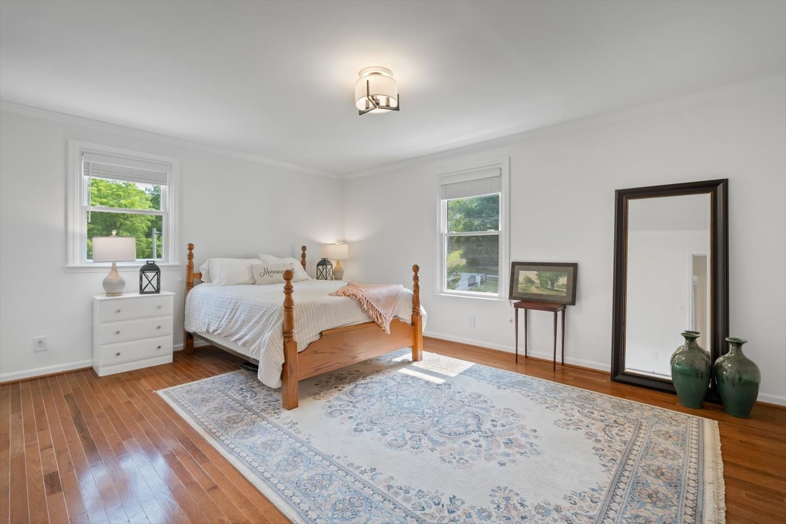 775 High Point Ridge Road Franklin, TN 37069 - Photo 14 of 41 a bed room with a bed and a potted plant
